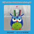 Promotional ceramic utensil holder with monkey design